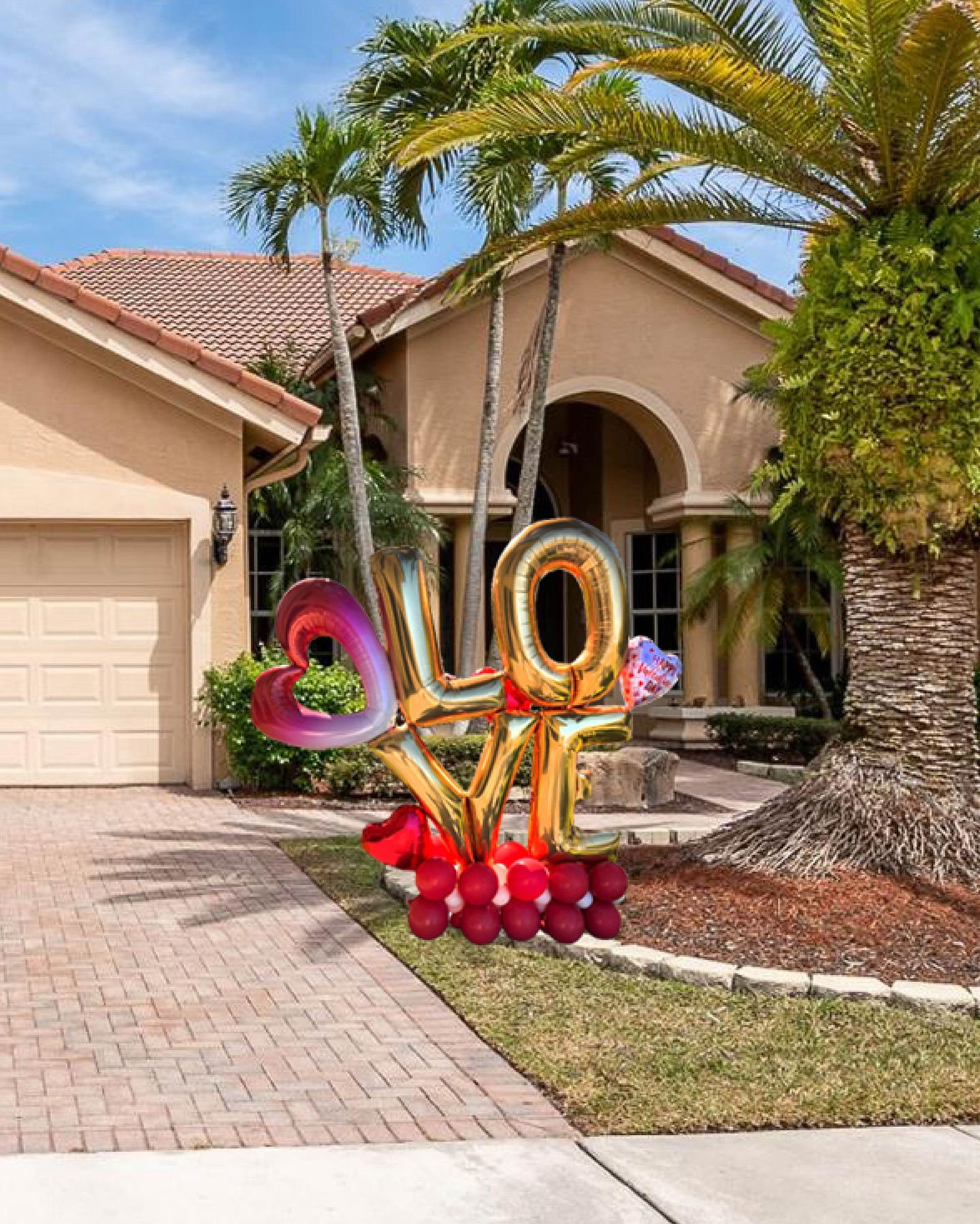 Custom birthday balloon decoration setup at home in Prosper, Texas